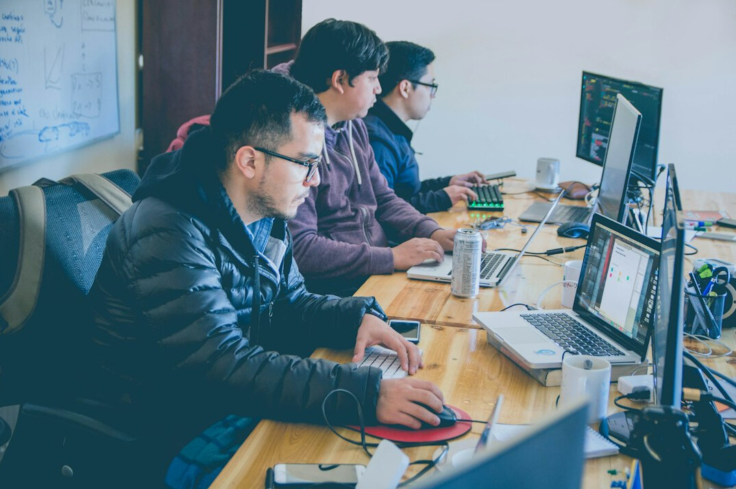 team of programmers collaborating