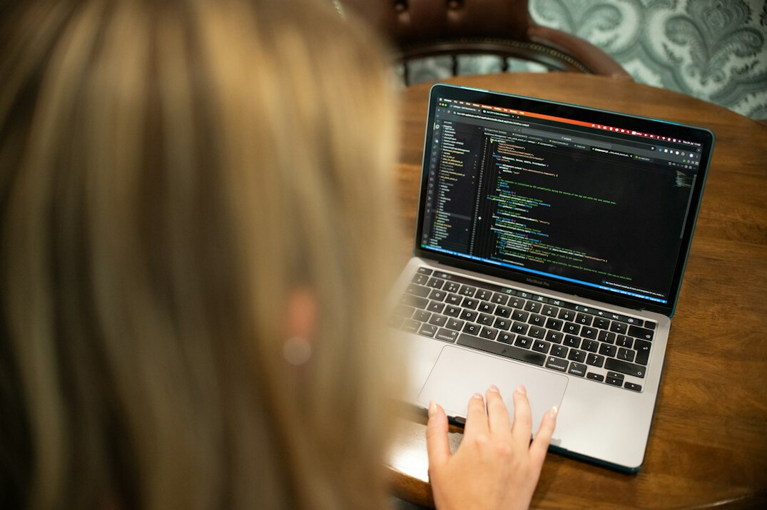 woman reviewing data on screen